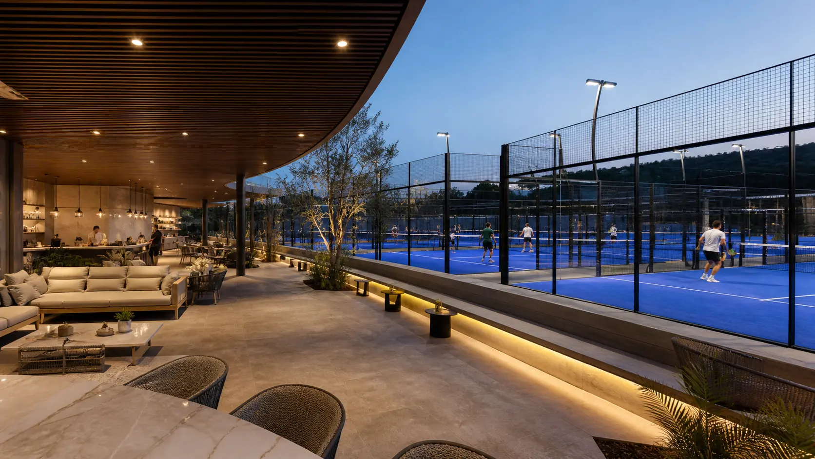 Terraza lounge con vista a canchas de padel
